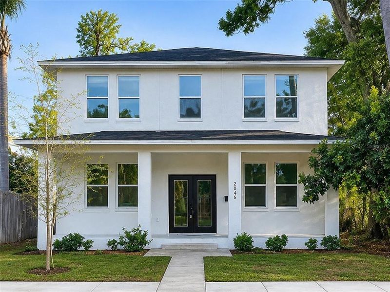 Front exterior of a new home in , St. Petersburg, FL, highlighting curb appeal (Image 1). Front exterior of a new home in , St. Petersburg, FL, highlighting curb appeal (Image 1).