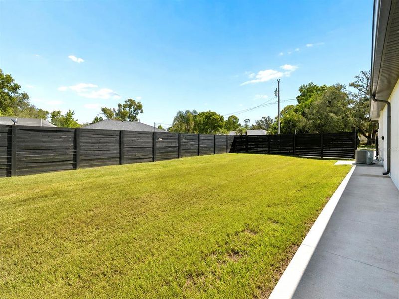 Exterior details and patio area of a home in , Spring Hill (Image 33).