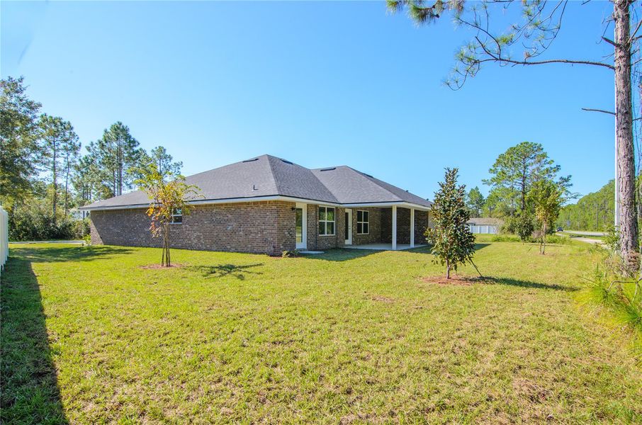 Exterior details and patio area of a home in Palm Coast, Palm Coast (Image 26).