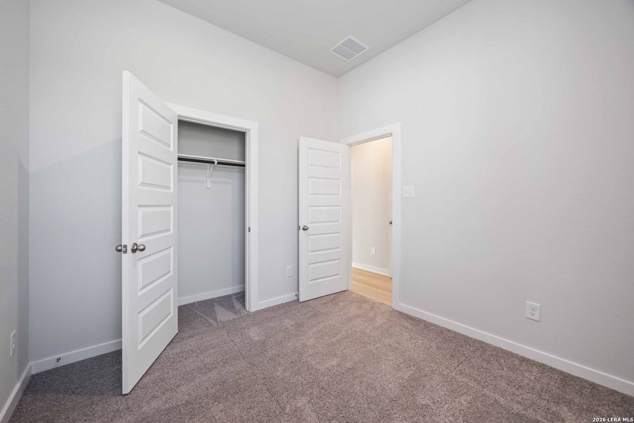 Spacious, unfurnished interior of a new home in Red Hawk Landing, San Antonio (Image 11).