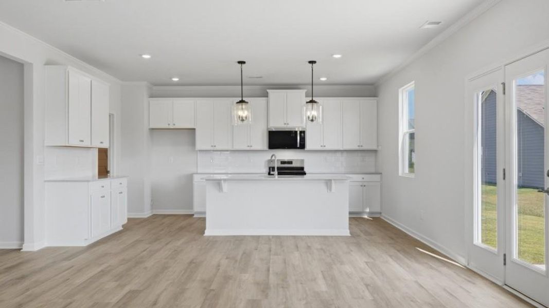 Furnished interior view inside a new home in Fairway 17 at Mirror Lake, Villa Rica (Image 6).