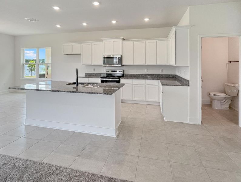 Furnished interior view inside a new home in Harmony Central, St. Cloud (Image 5).