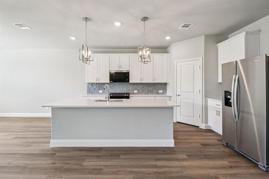 Furnished interior view inside a new home in Lakehaven - Premier Series, Farmersville (Image 4). Furnished interior view inside a new home in Lakehaven - Premier Series, Farmersville (Image 4).