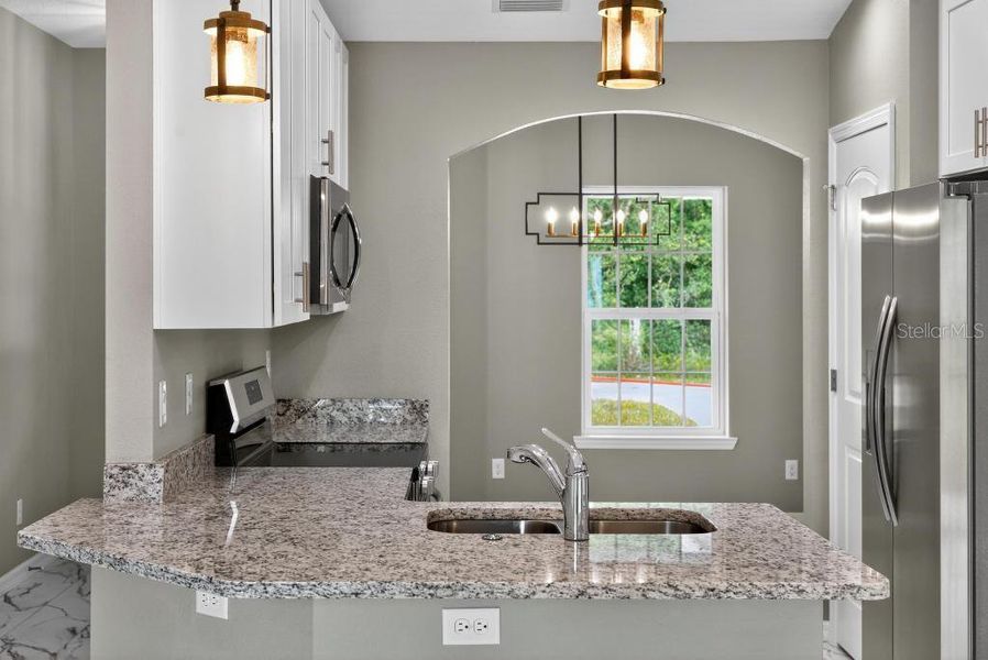 Furnished interior view inside a new home in , Ocklawaha (Image 6).