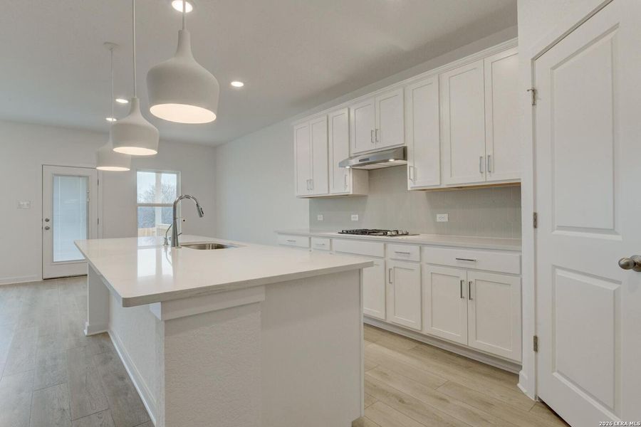 Furnished interior view inside a new home in Nopal Valley, San Antonio (Image 8).