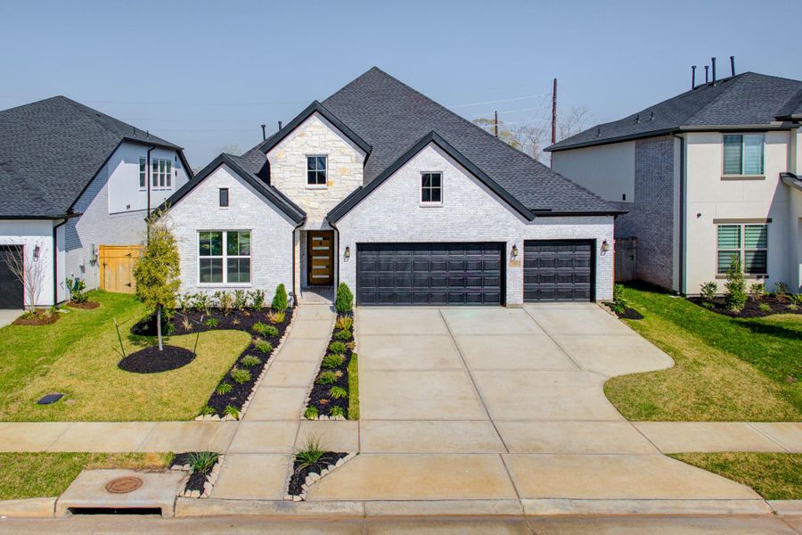 Front exterior of a new home in , Missouri City, TX, highlighting curb appeal (Image 26).