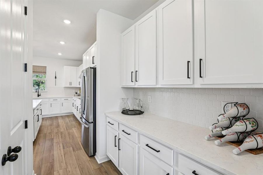 Furnished interior view inside a new home in Hawks Run, Kissimmee (Image 54).