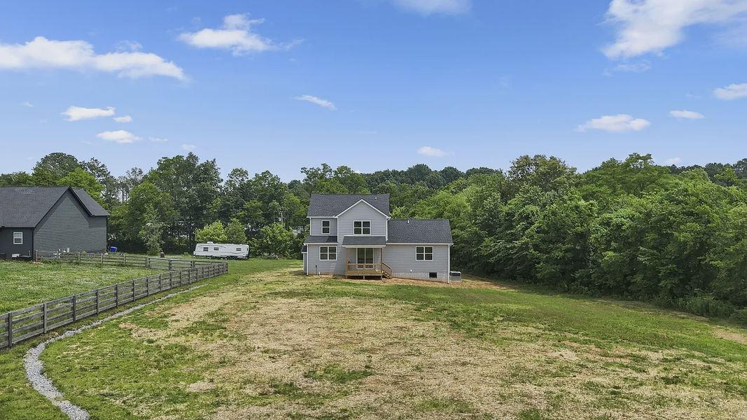 Front exterior of a new home in Judah Hills, Portland, TN, highlighting curb appeal (Image 2).
