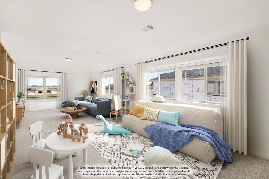 Spacious bonus room with carpet, large windows, seating area, and children's play space with toys and small table.