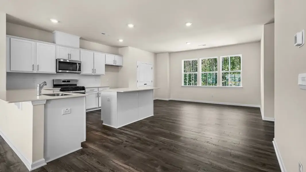 Furnished interior view inside a new home in The Townes at Madden West, Fuquay Varina (Image 4).