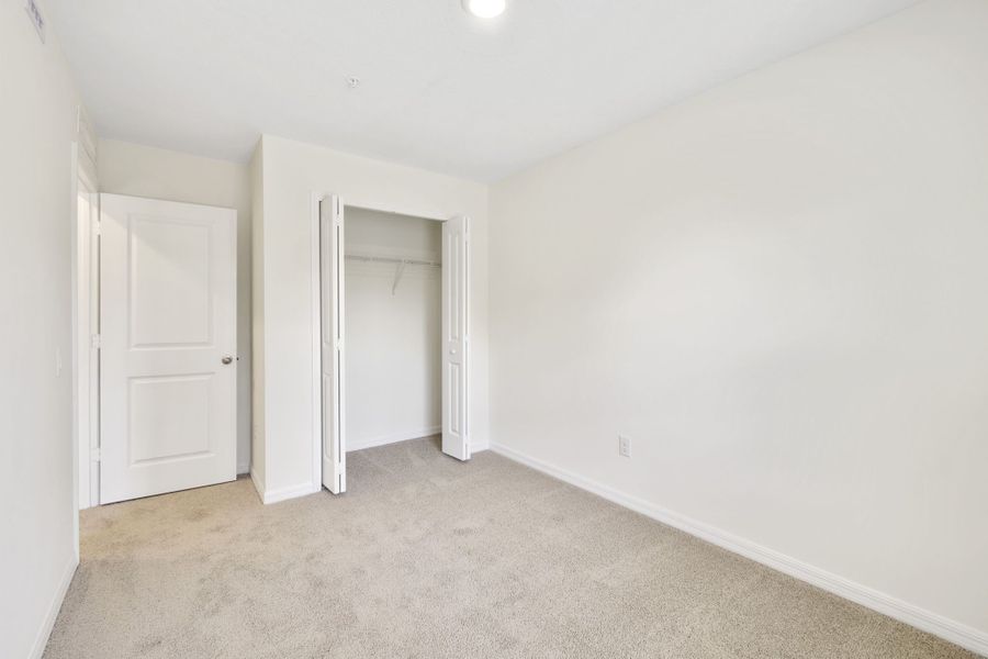 Spacious, unfurnished interior of a new home in Towns at Riverwalk, Sanford (Image 24). Spacious, unfurnished interior of a new home in Towns at Riverwalk, Sanford (Image 24).