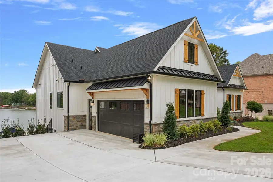 Front exterior of a new home in , Mooresville, NC, highlighting curb appeal (Image 2). Front exterior of a new home in , Mooresville, NC, highlighting curb appeal (Image 2).