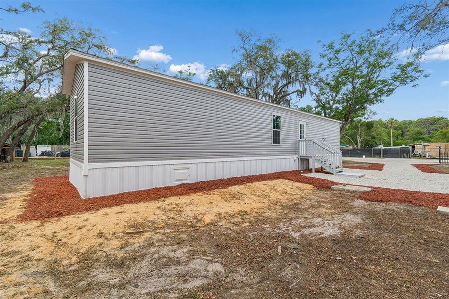Exterior details and patio area of a home in , New Port Richey (Image 29).