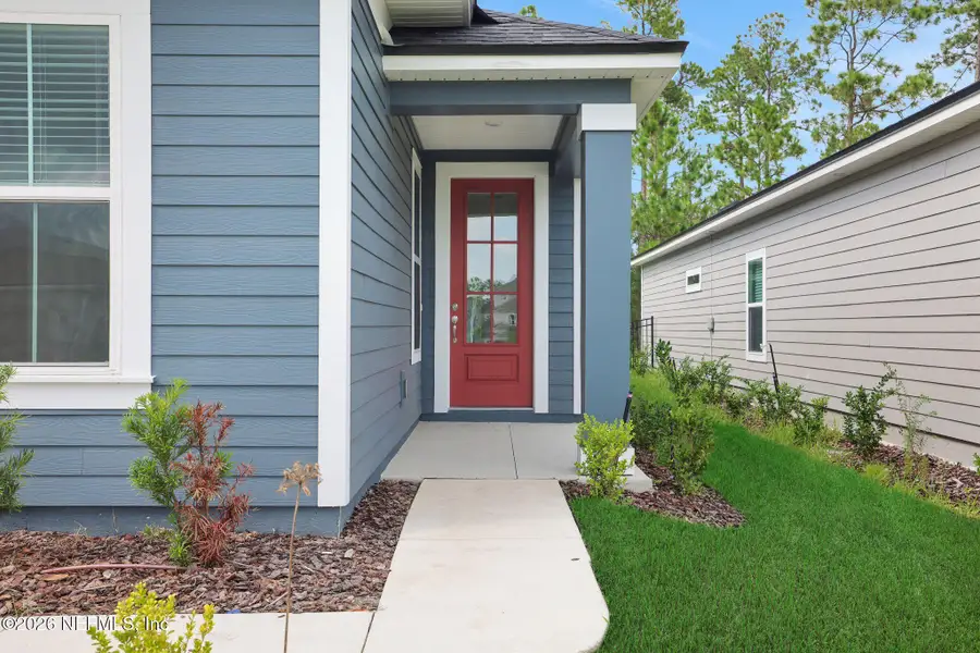 Exterior details and patio area of a home in Hyland Trail, Middleburg (Image 3).