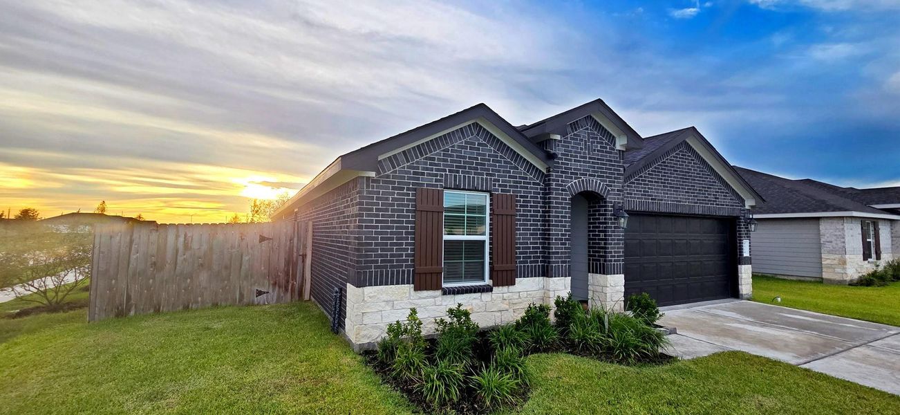 Front exterior of a new home in , Rosharon, TX, highlighting curb appeal (Image 15). Front exterior of a new home in , Rosharon, TX, highlighting curb appeal (Image 15).