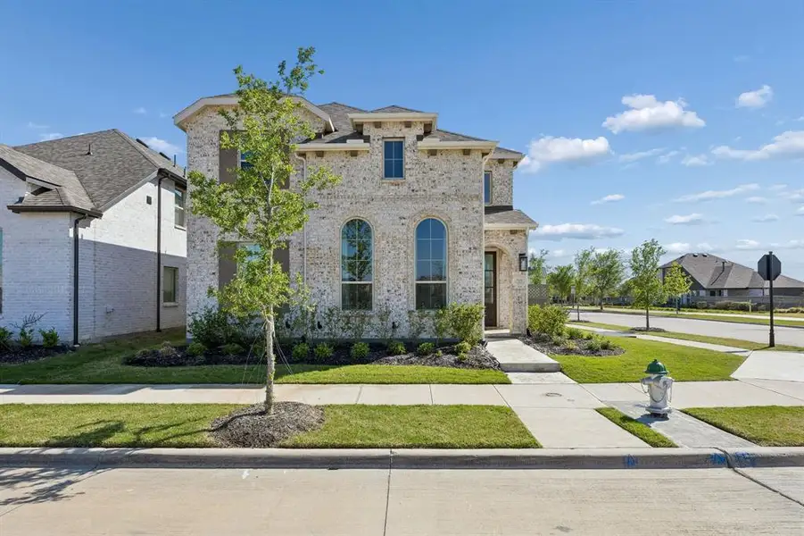 Front exterior of a new home in , Northlake, TX, highlighting curb appeal (Image 1). Front exterior of a new home in , Northlake, TX, highlighting curb appeal (Image 1).