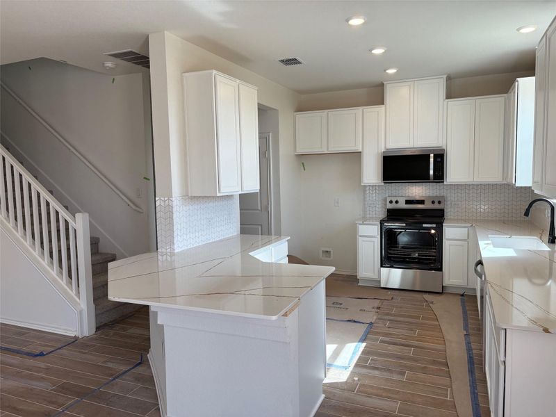Furnished interior view inside a new home in Creekside at Estancia, Austin (Image 9). Furnished interior view inside a new home in Creekside at Estancia, Austin (Image 9).