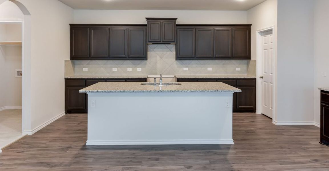 Representative exterior photo of a completed home built from the Adina by Impression Homes in Heartland, Heartland, TX (Image 6). Representative exterior photo of a completed home built from the Adina by Impression Homes in Heartland, Heartland, TX (Image 6).