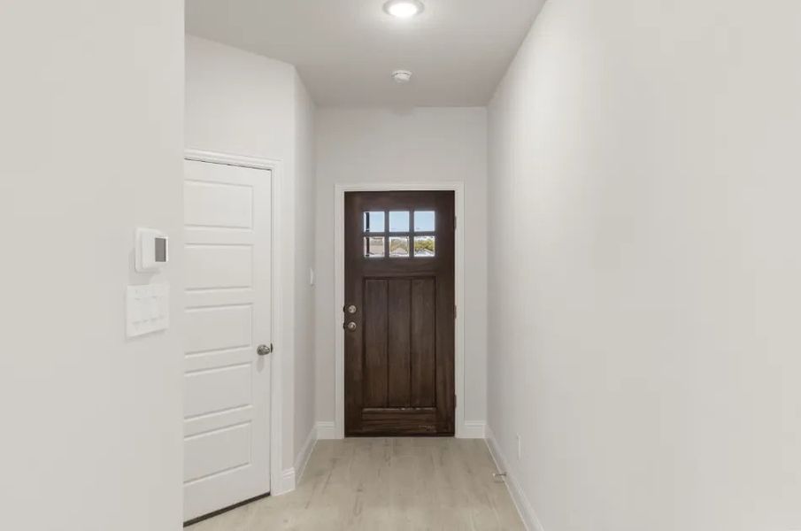 Front exterior of a new home in Sereno Oaks at Buckner Terrace, Dallas, TX, highlighting curb appeal (Image 8).