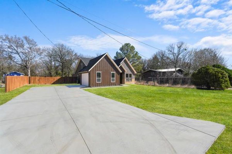 Front exterior of a new home in , Tool, TX, highlighting curb appeal (Image 27). Front exterior of a new home in , Tool, TX, highlighting curb appeal (Image 27).