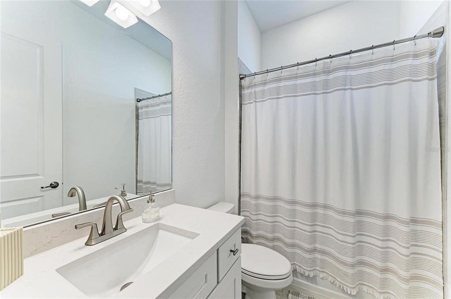 Furnished interior view inside a new home in Calusa Country Club, Lakewood Ranch (Image 39).