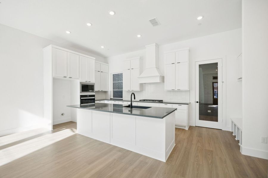 Furnished interior view inside a new home in Newman Village Townhomes, Frisco (Image 9).