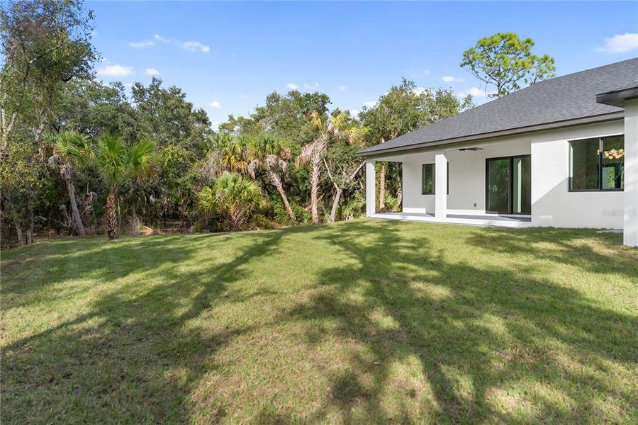 Exterior details and patio area of a home in , Port Charlotte (Image 37).