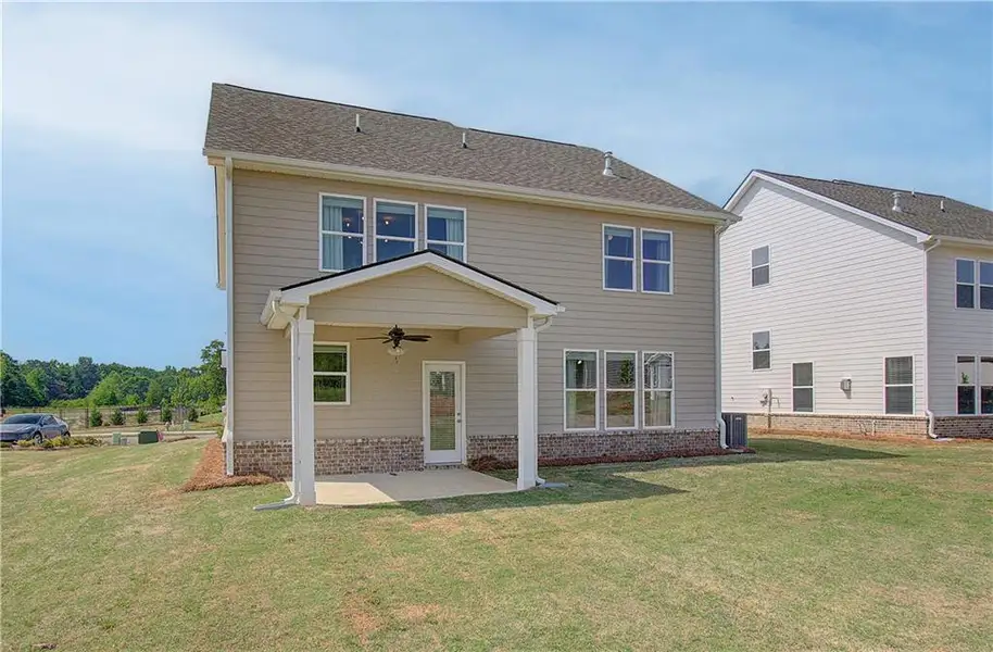 Exterior details and patio area of a home in Cooper Park, McDonough (Image 4).