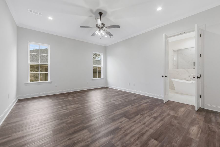 Representative unfurnished interior of a home built from the The Lafitte by Manuel Builders in Chapel Bend, Montgomery (Image 19).