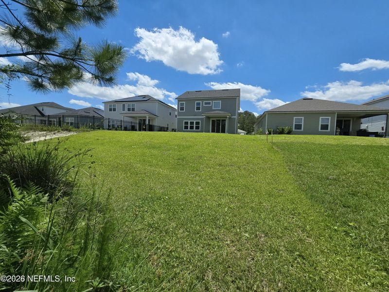 Exterior details and patio area of a home in Hyland Trail, Green Cove Springs (Image 36).