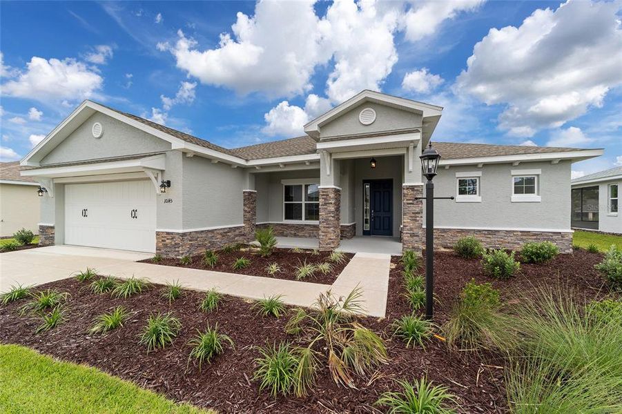 Exterior details and patio area of a home in On Top of the World Communities, Ocala (Image 21).