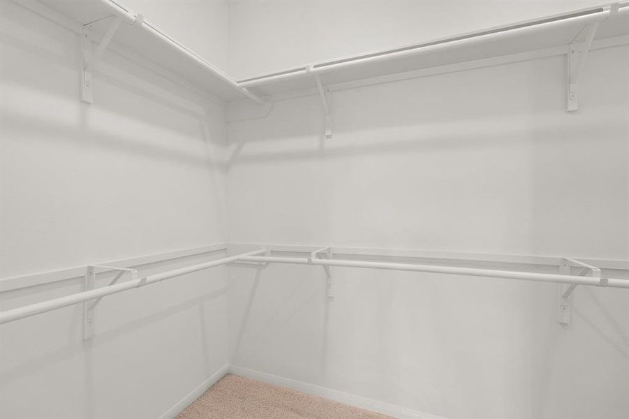 A view of your large primary walk-in Closet