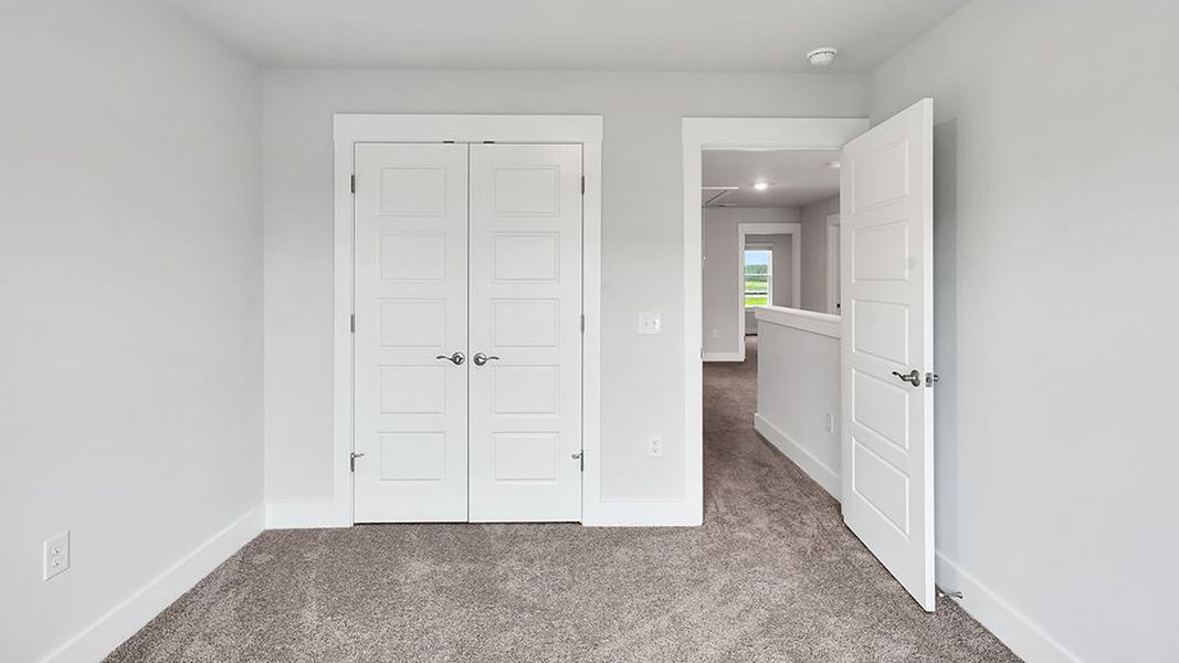 Spacious, unfurnished interior of a new home in The Landing at Sidbury Station, Castle Hayne (Image 29).
