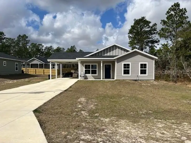 Front exterior of a new home in , Williston, FL, highlighting curb appeal (Image 2). Front exterior of a new home in , Williston, FL, highlighting curb appeal (Image 2).