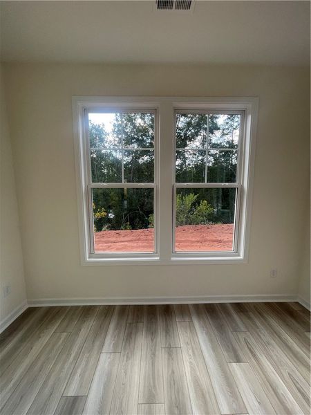 Spacious, unfurnished interior of a new home in Springwood Grove, Central (Image 22).