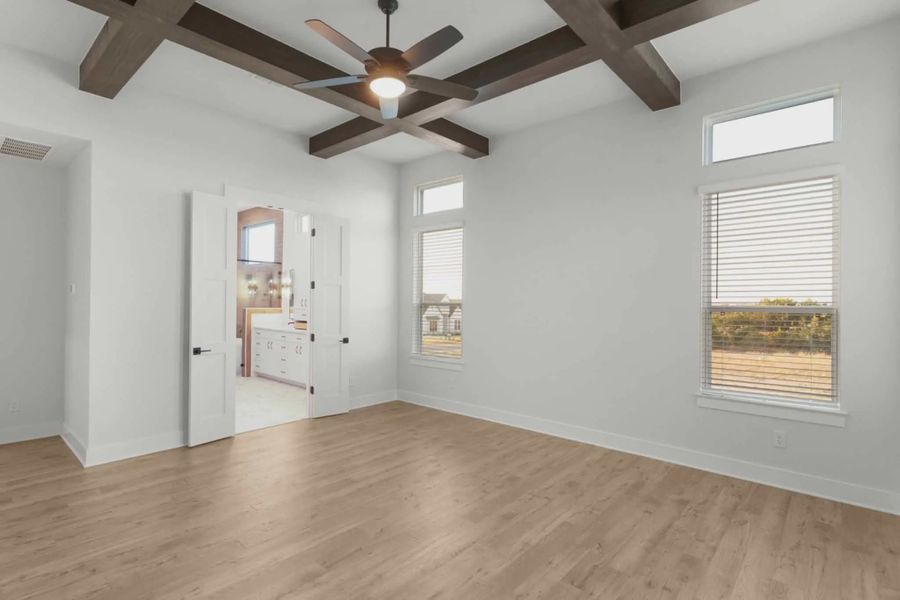 Representative unfurnished interior of a home built from the Merritt by Chesmar Homes in Feathergrass, Fulshear (Image 11).