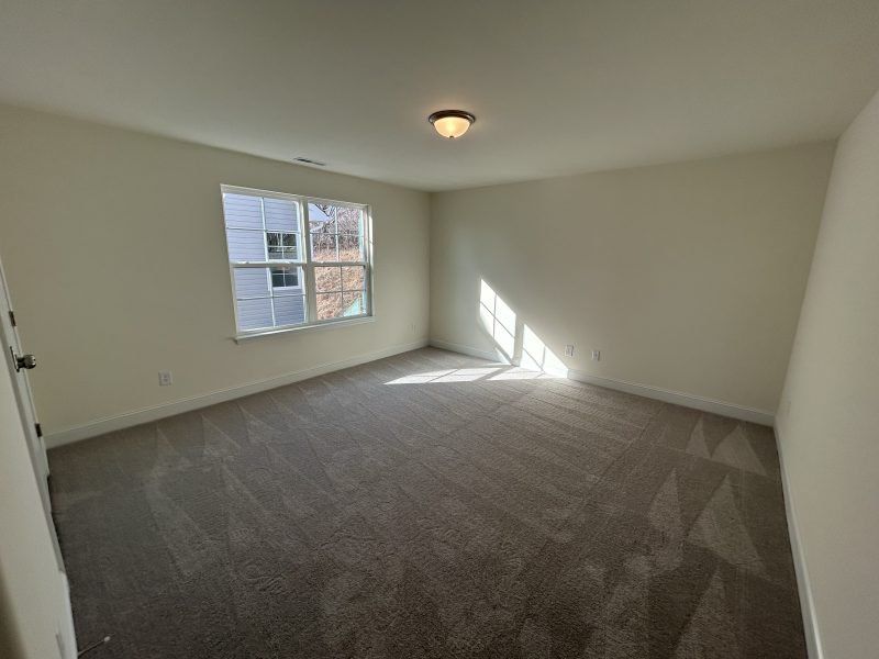 Spacious, unfurnished interior of a new home in Miller's Reserve, Winston-Salem (Image 52).