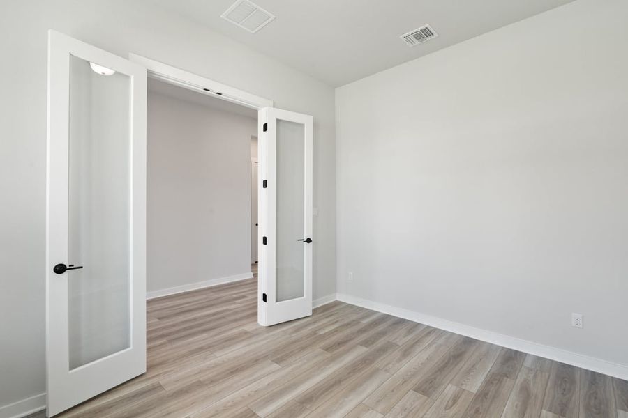 Spacious, unfurnished interior of a new home in Capitol Collection at Lariat, Liberty Hill (Image 18).