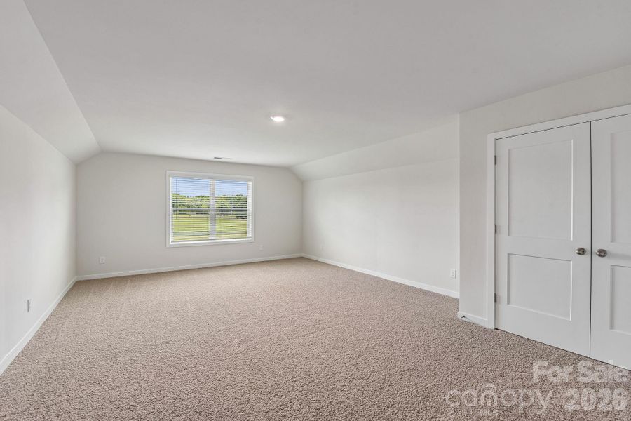 Spacious, unfurnished interior of a new home in Sanctuary at Southgate, Indian Trail (Image 34).