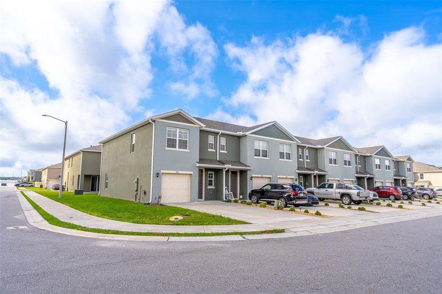 Front exterior of a new home in , Davenport, FL, highlighting curb appeal (Image 21).