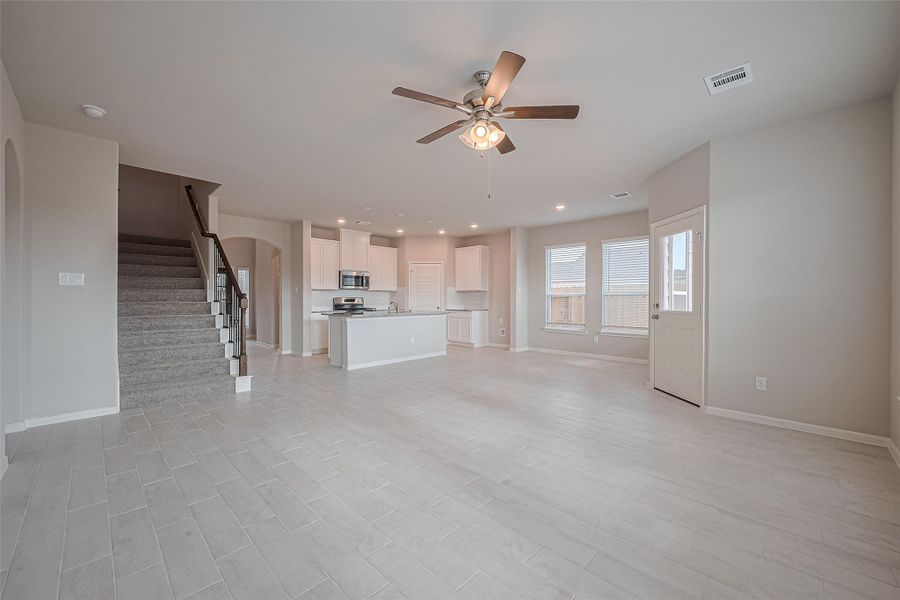 Spacious, unfurnished interior of a new home in Sunterra, Katy (Image 22).