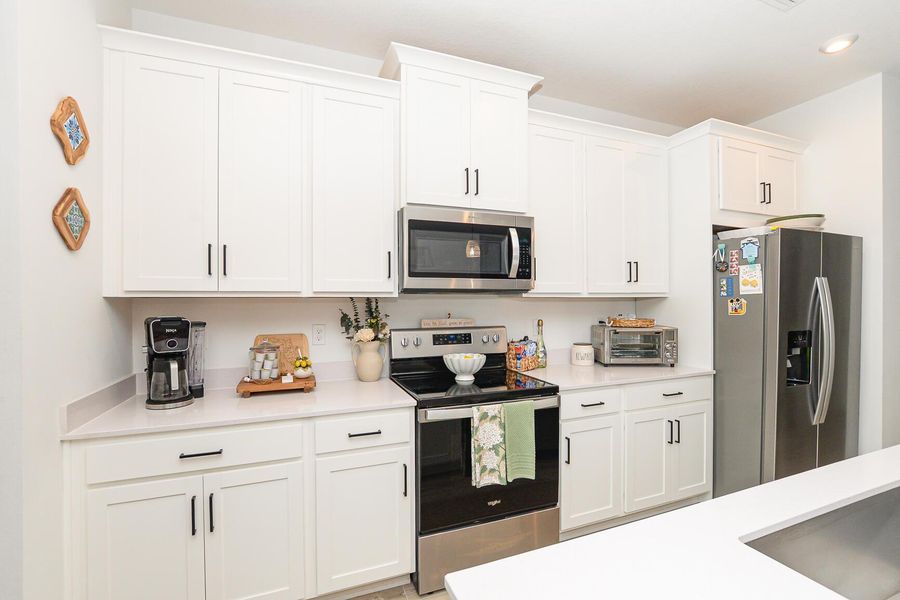 Furnished interior view inside a new home in , Port St. Lucie (Image 36).