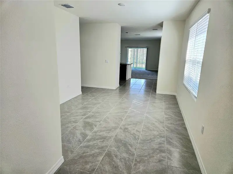 Spacious, unfurnished interior of a new home in Charles Cove Express, Davenport (Image 16).