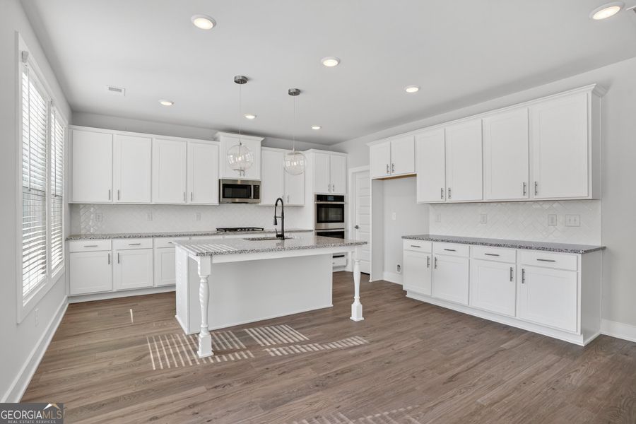 Furnished interior view inside a new home in The Fairways at Mirror Lake, Villa Rica (Image 37).