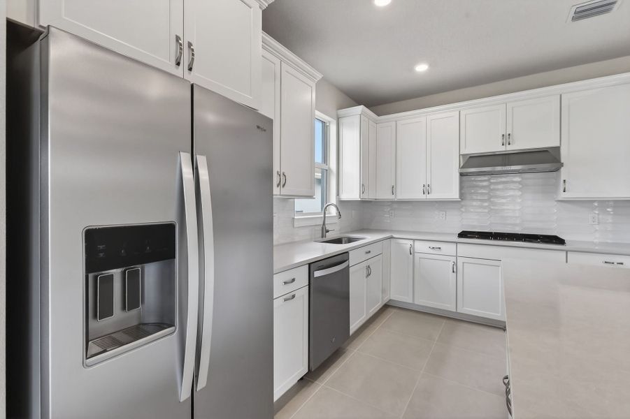 Furnished interior view inside a new home in Del Webb Tradition, Port St. Lucie (Image 17).