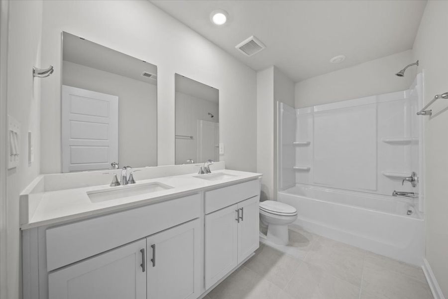 Furnished interior view inside a new home in The Farm at Wells Creek - Signature Collection, Gray Court (Image 9).