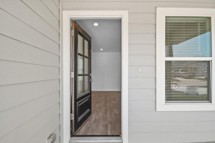 Exterior details and patio area of a home in William Trails, Willis (Image 2). Exterior details and patio area of a home in William Trails, Willis (Image 2).