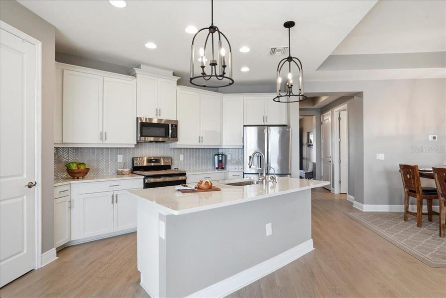 Furnished interior view inside a new home in Cypress Glen at River Wilderness, Parrish (Image 18).