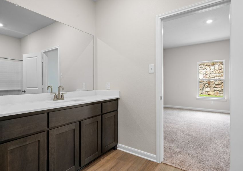 The master bathroom has a sprawling vanity. The master bathroom has a sprawling vanity.