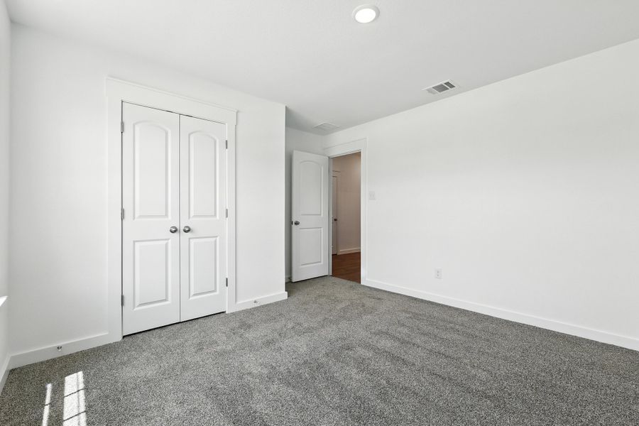 Representative unfurnished interior of a home built from the Landmark Series - Blanton by Brightland Homes in Still Water Lake Estates, Godley (Image 24). Representative unfurnished interior of a home built from the Landmark Series - Blanton by Brightland Homes in Still Water Lake Estates, Godley (Image 24).